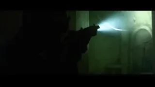 Silhouette holding gun in foggy room — The Matrix