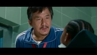 man speaking to girl in green tiled room — The Karate Kid