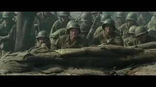 Man in dark room, head in hands — Hacksaw Ridge