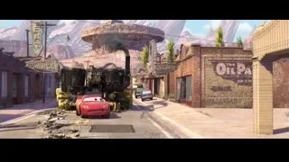 cars driving past steam locomotive — Cars
