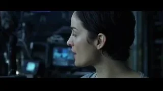 woman with dark hair in dark room — The Matrix