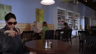 Woman in restaurant with head in hands — Breaking Bad