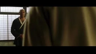 bald man in martial arts pose — The Matrix