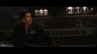Man sitting on bench in stadium at night — Ford v Ferrari