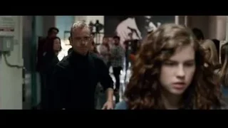 man and woman talking in hallway — Steve Jobs