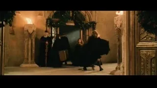 young girl with suitcase in hallway — Harry Potter and the Philosophers Stone