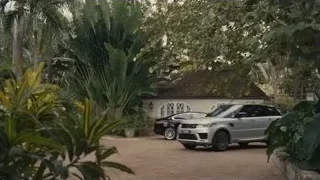 car parked in front of white house — Succession