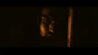 person's face in dark with glasses — Into the Wild