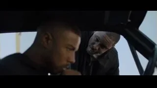 two men in car deep in thought — Creed 2