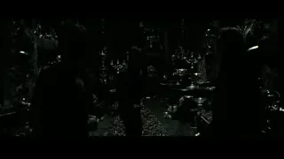 people in dimly lit museum-like room — Harry Potter and the Deathly Hallows 2