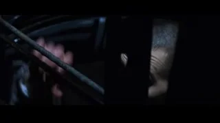 woman's face in dark eerie setting — The Matrix