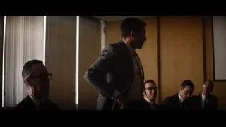 man in suit addressing men in conference — Ford v Ferrari