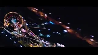 city skyline at night with colorful lights — Iron Man