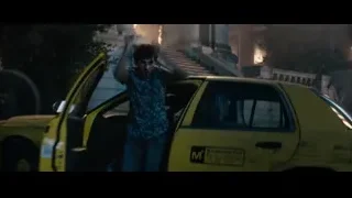 young man with yellow taxi and fire — Deadpool 2