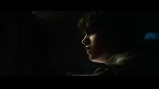 Young man's face in dark with blue light — Superman: Man of Steel