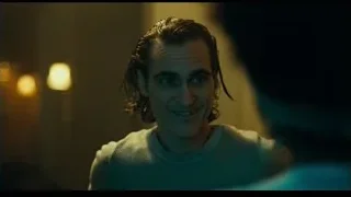close-up of man's serious face — Joker