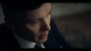 man in dark suit with eyes closed — Peaky Blinders