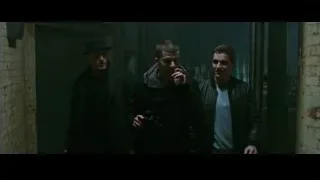Three men in dim room with glass door — Now You See Me 2
