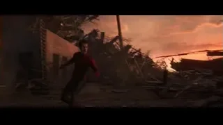 Man in red suit in destroyed building — Spiderman: No Way Home