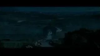 eerie bridge over river at night — Gladiator 2