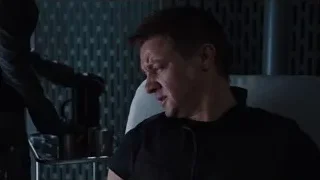 man sitting in chair with eyes closed — The Avengers