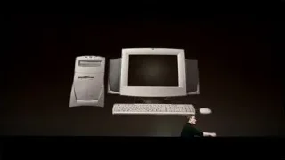 man presenting Apple computer on screen — Steve Jobs