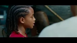 young girl looking out window — The Karate Kid