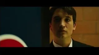Man in suit looking with slight smile — Whiplash