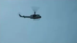white helicopter flying in clear blue sky — Elon Musk: Return to Space