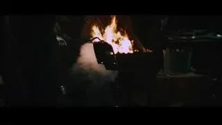 hand working on fire in dark room — Iron Man