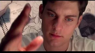 man contemplating symbol on whiteboard — Spider Man
