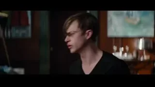Young man with serious expression in dark room — The Amazing Spider Man 2