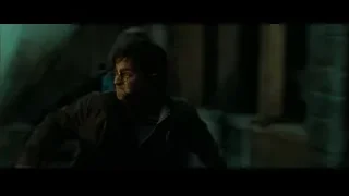 man standing in dark stone doorway — Harry Potter and the Deathly Hallows 2