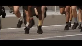 Group of people running on street — F1
