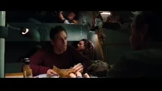 group of people in dimly lit room — The Secret Life of Walter Mitty