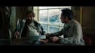 two men at table looking out window — The Secret Life of Walter Mitty