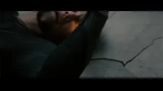 Man lying on concrete floor — Superman: Man of Steel