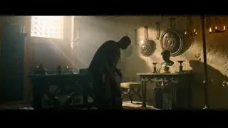 Man in long robe in dimly lit room — Gladiator 2