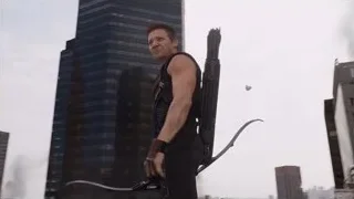 man with bow and arrow on skyscraper — The Avengers