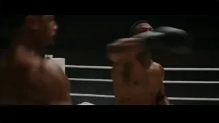 Two boxers fighting in a ring — Creed 3