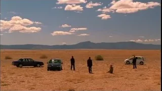 people and cars in open field — Breaking Bad