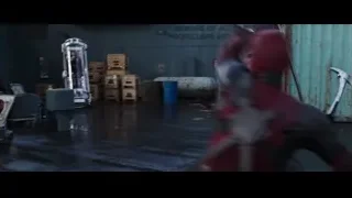 Deadpool and Iron Man fighting in warehouse — Deadpool