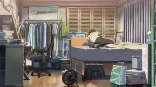 Young man sitting on bed in bedroom — Your Name