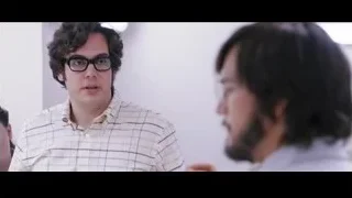 man speaking to group with glasses — Jobs