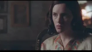 Woman's serious face in floral blouse — Peaky Blinders
