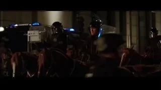 police officers on city street at night — Batman