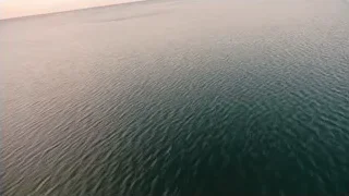 aerial view of calm water at sunset — Interstellar
