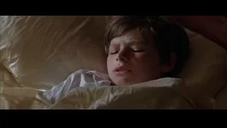 Young boy sleeping in bed — Batman