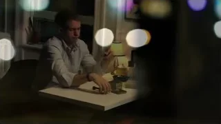 young man deep in thought at desk — Suits