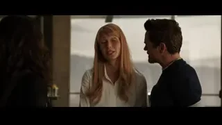 three people in room with large window — Iron Man 3